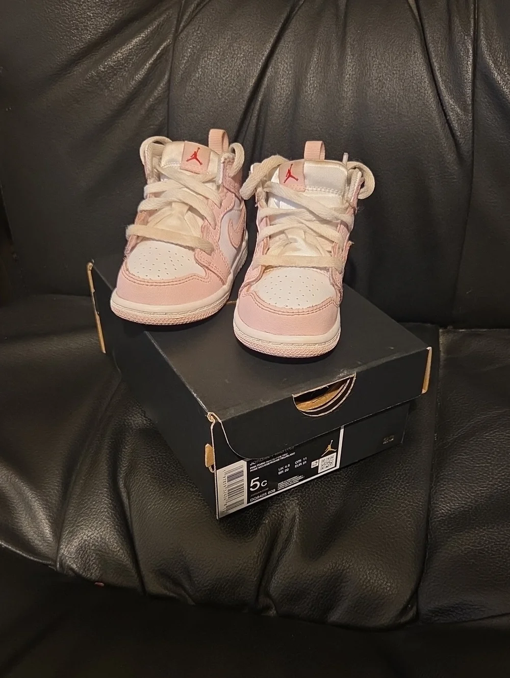 Jordan Kids Pink and White High-Top Sneakers